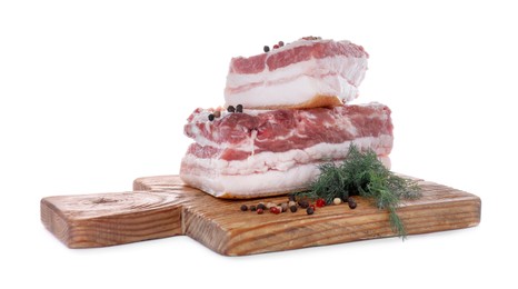 Photo of Pieces of pork fatback served with dill and spices isolated on white