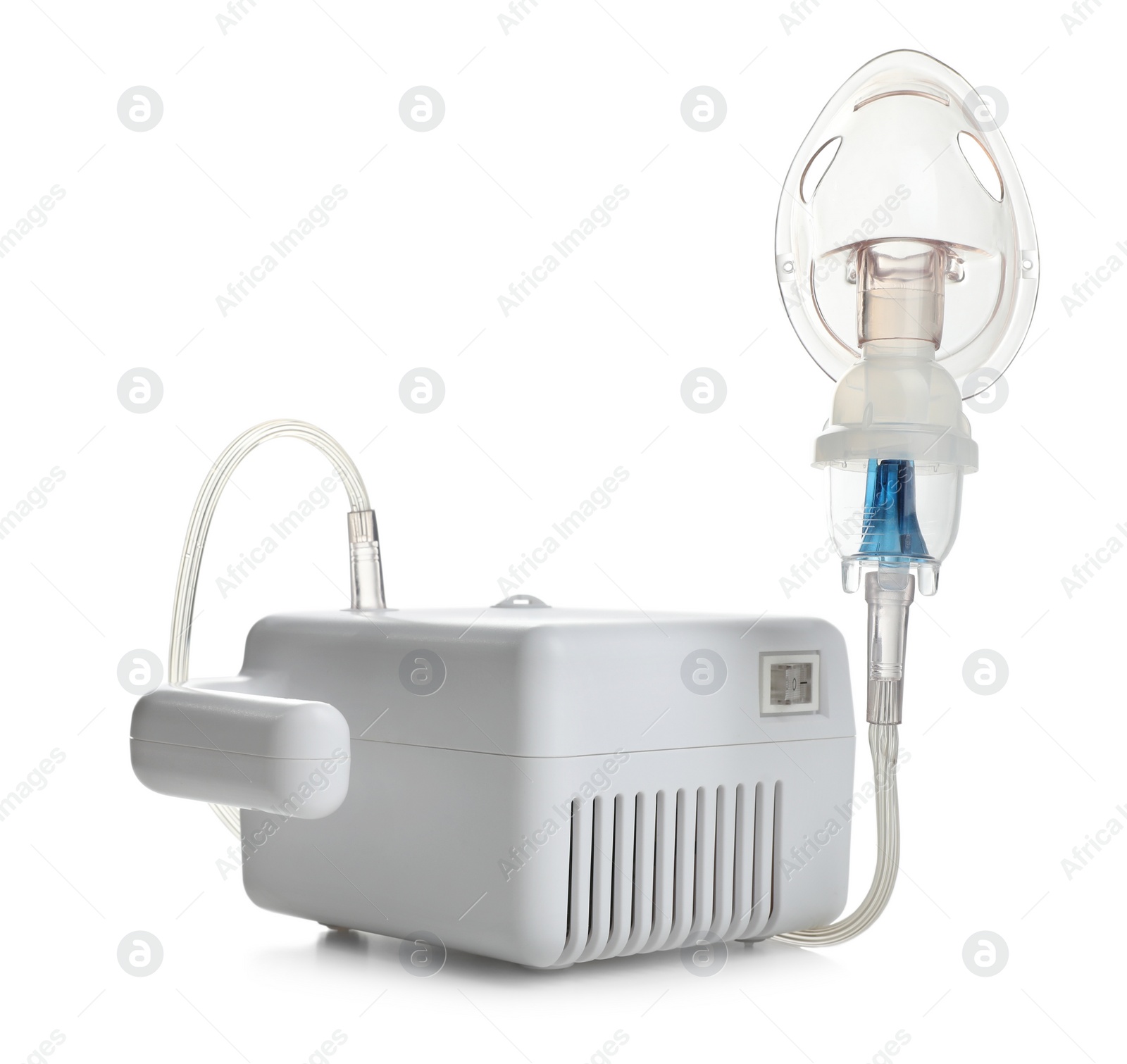 Photo of Modern nebulizer with face mask on white background. Inhalation equipment