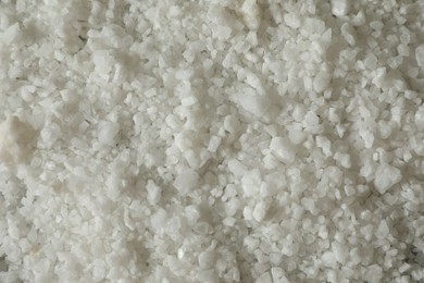 Photo of Organic sea salt as background, top view