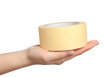 Woman holding beige adhesive tape on white background, closeup