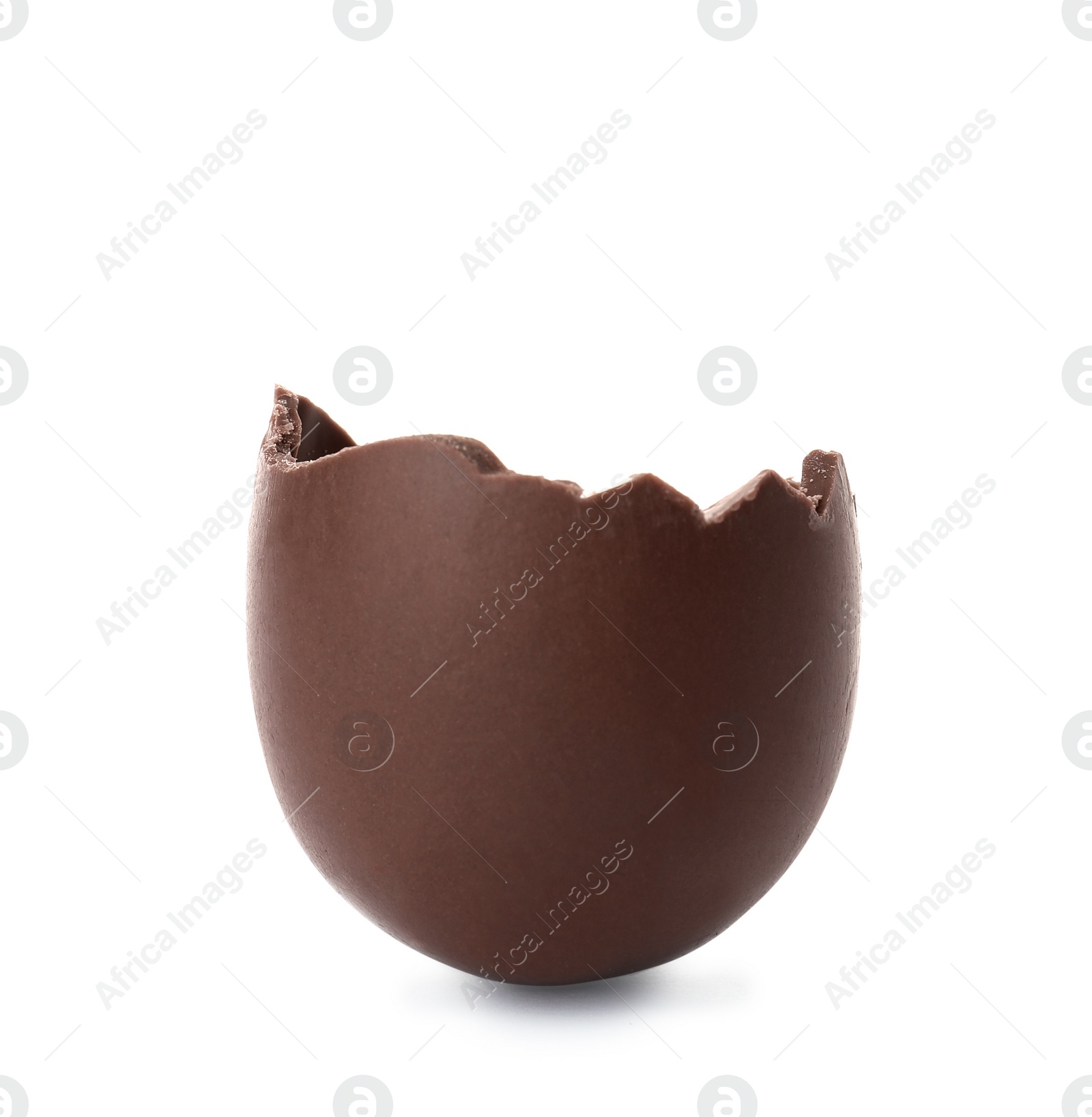 Photo of Cracked chocolate Easter egg on white background