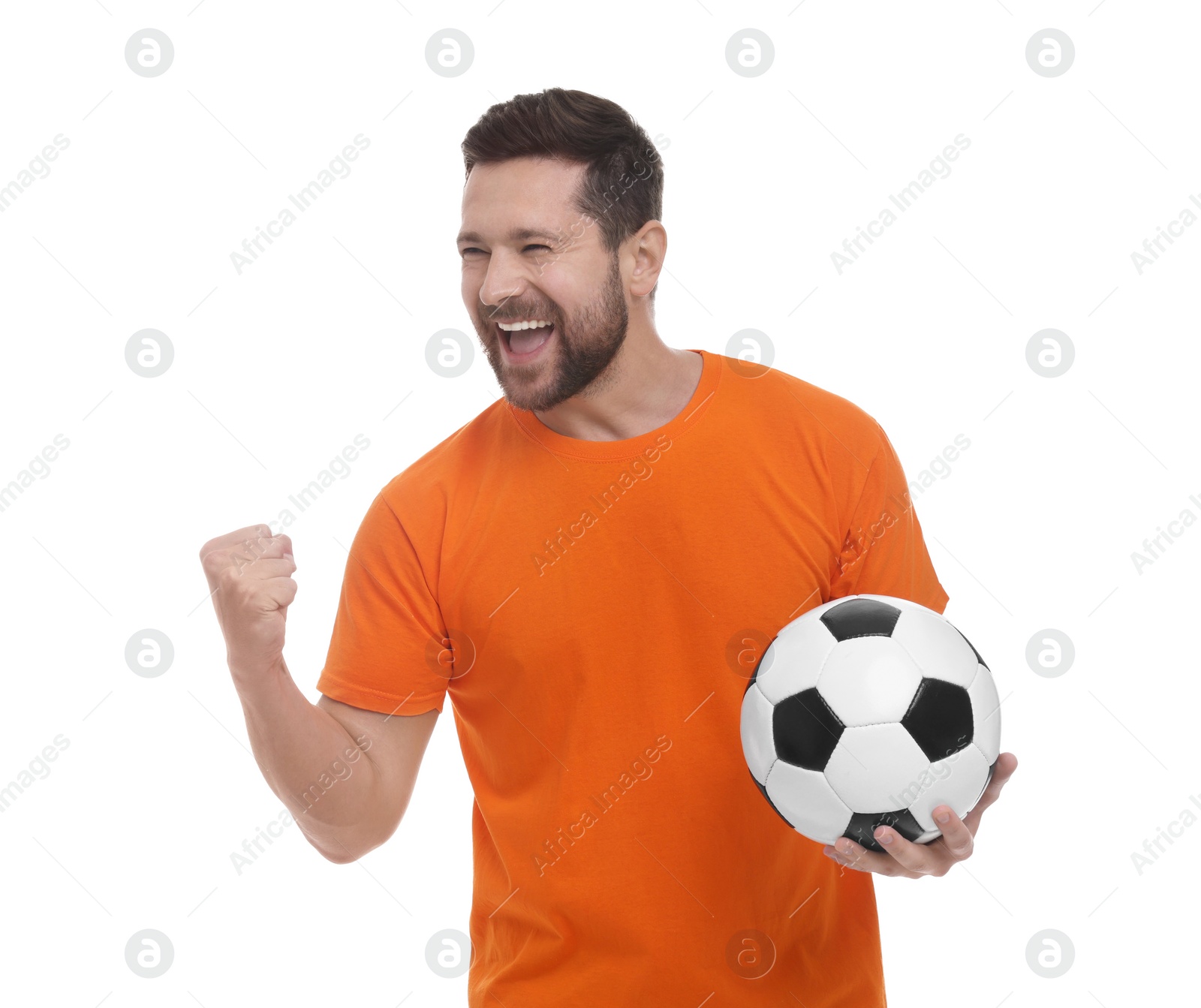 Photo of Emotional sports fan with ball celebrating on white background