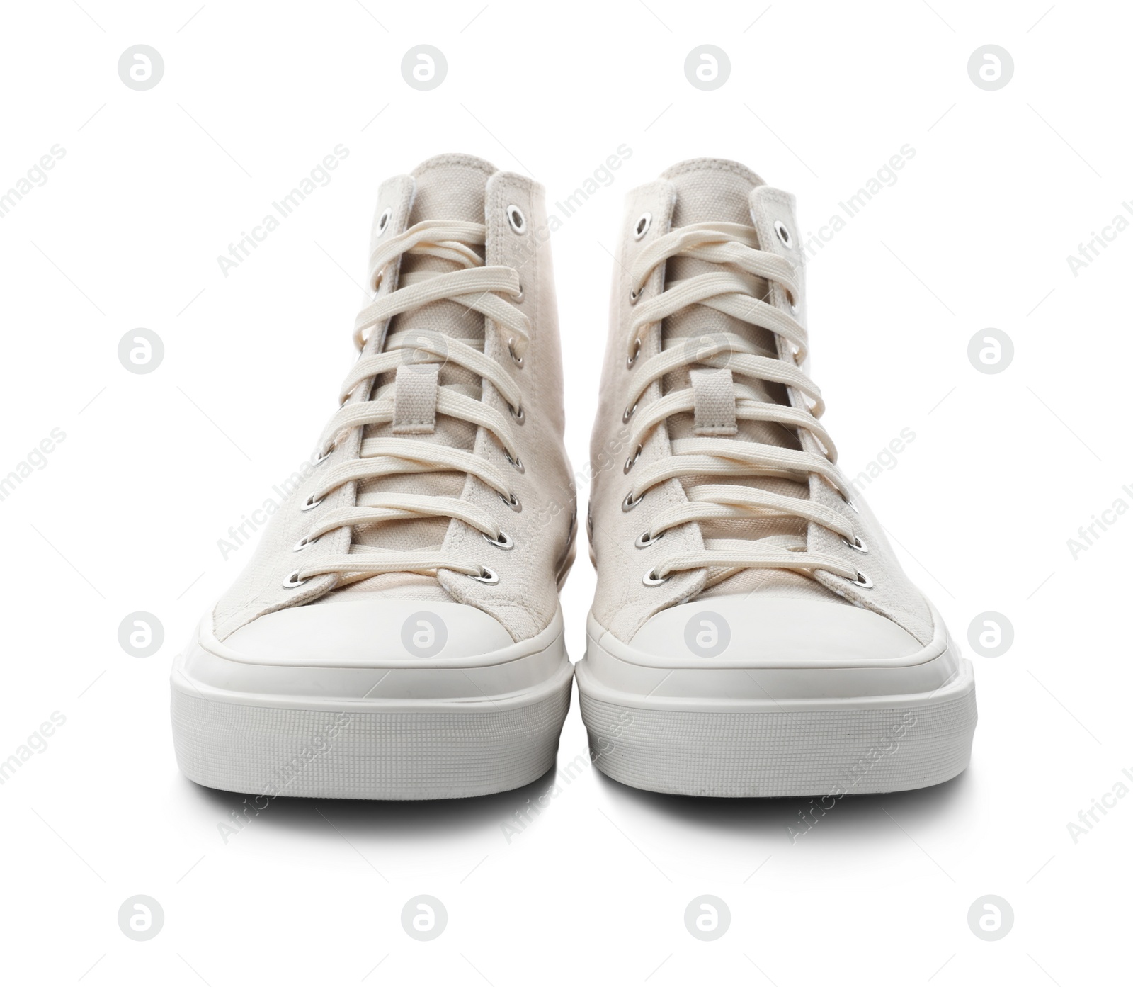 Photo of Stylish sneakers on white background