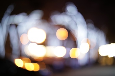 Photo of Beautiful street lights at night. Bokeh effect