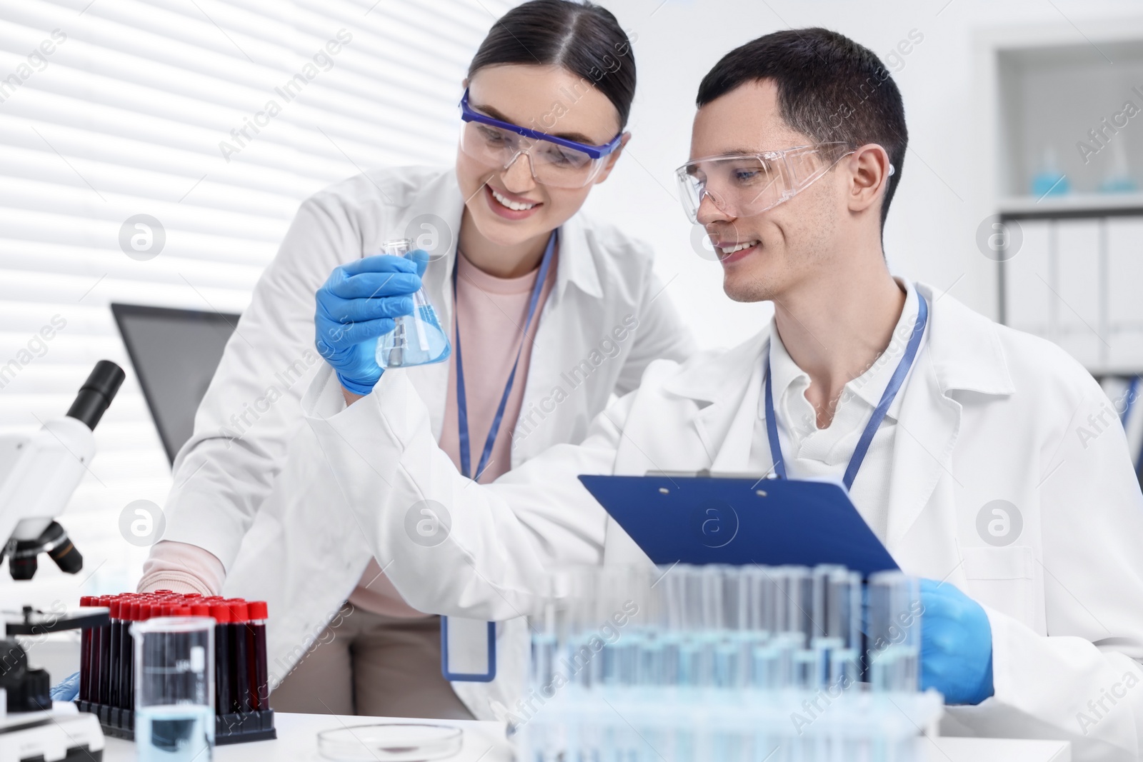 Photo of Scientists working with samples in laboratory. Medical research