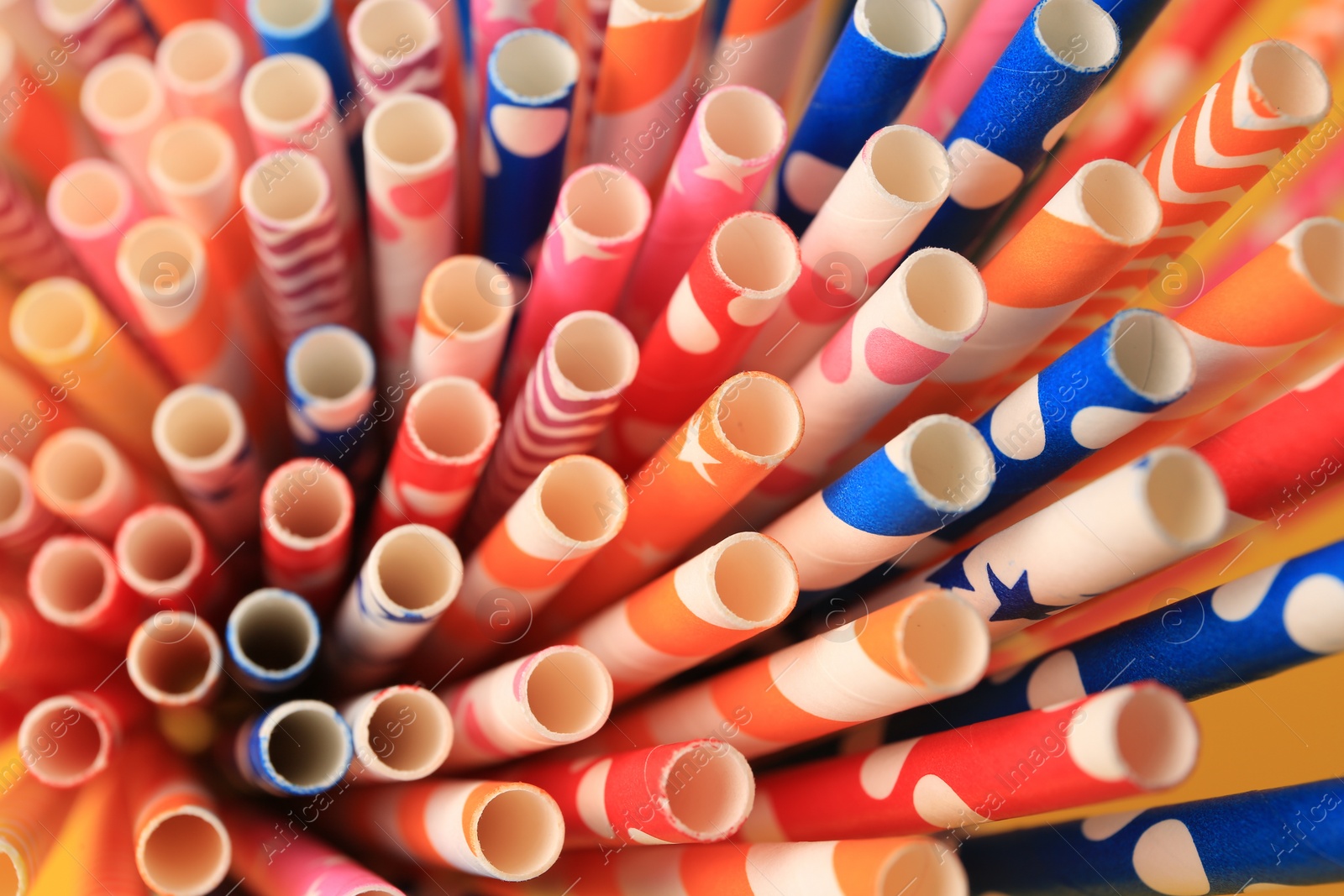 Photo of Many paper drinking straws as background, closeup