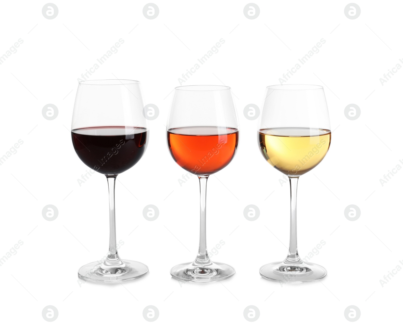Photo of Glasses of different wine on white background