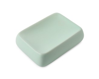 Bath accessory. Light green ceramic soap dish isolated on white