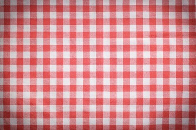 Image of Red and white tablecloth as background, vignette effect