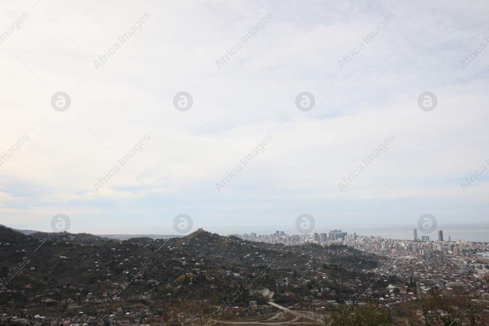 Photo of Picturesque view of city and sea under sky