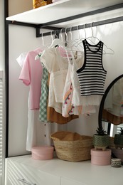 Closet interior with storage rack for clothes and accessories