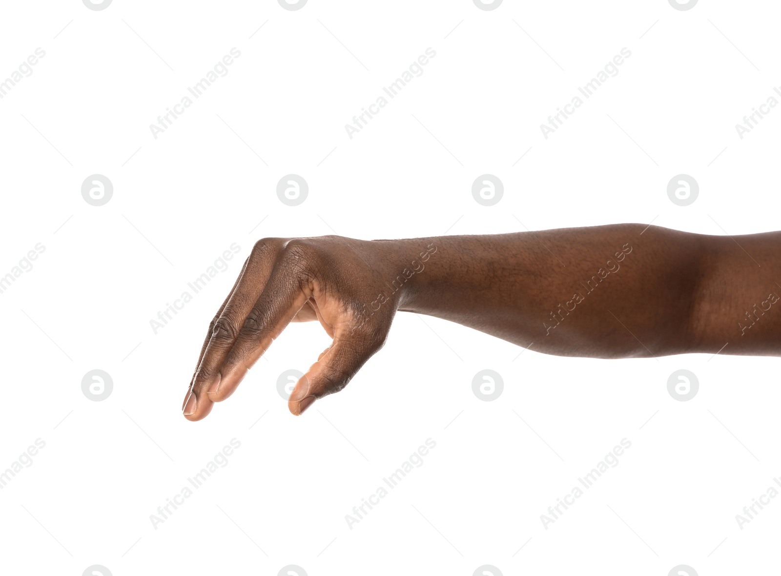 Photo of African-American man holding something in hand on white background, closeup