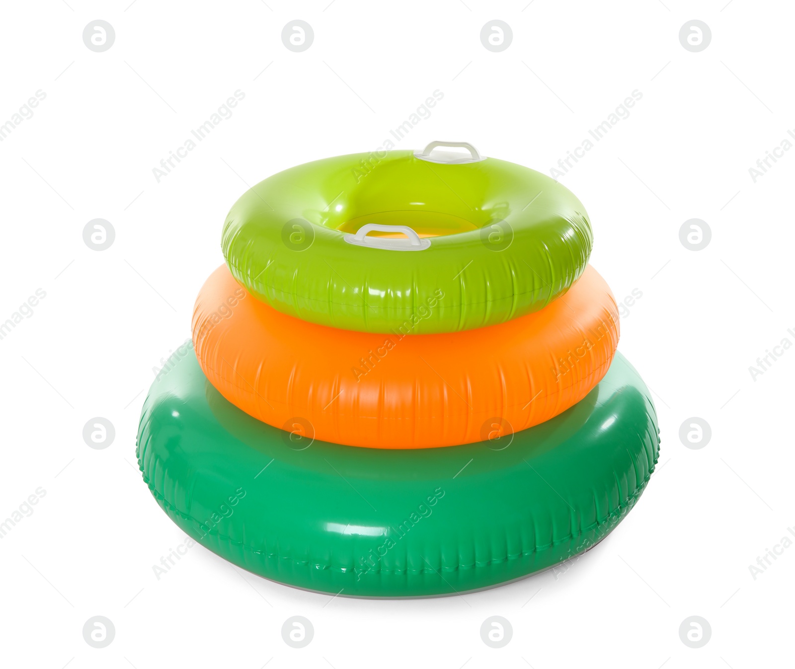 Photo of Different inflatable rings on white background. Summer holidays