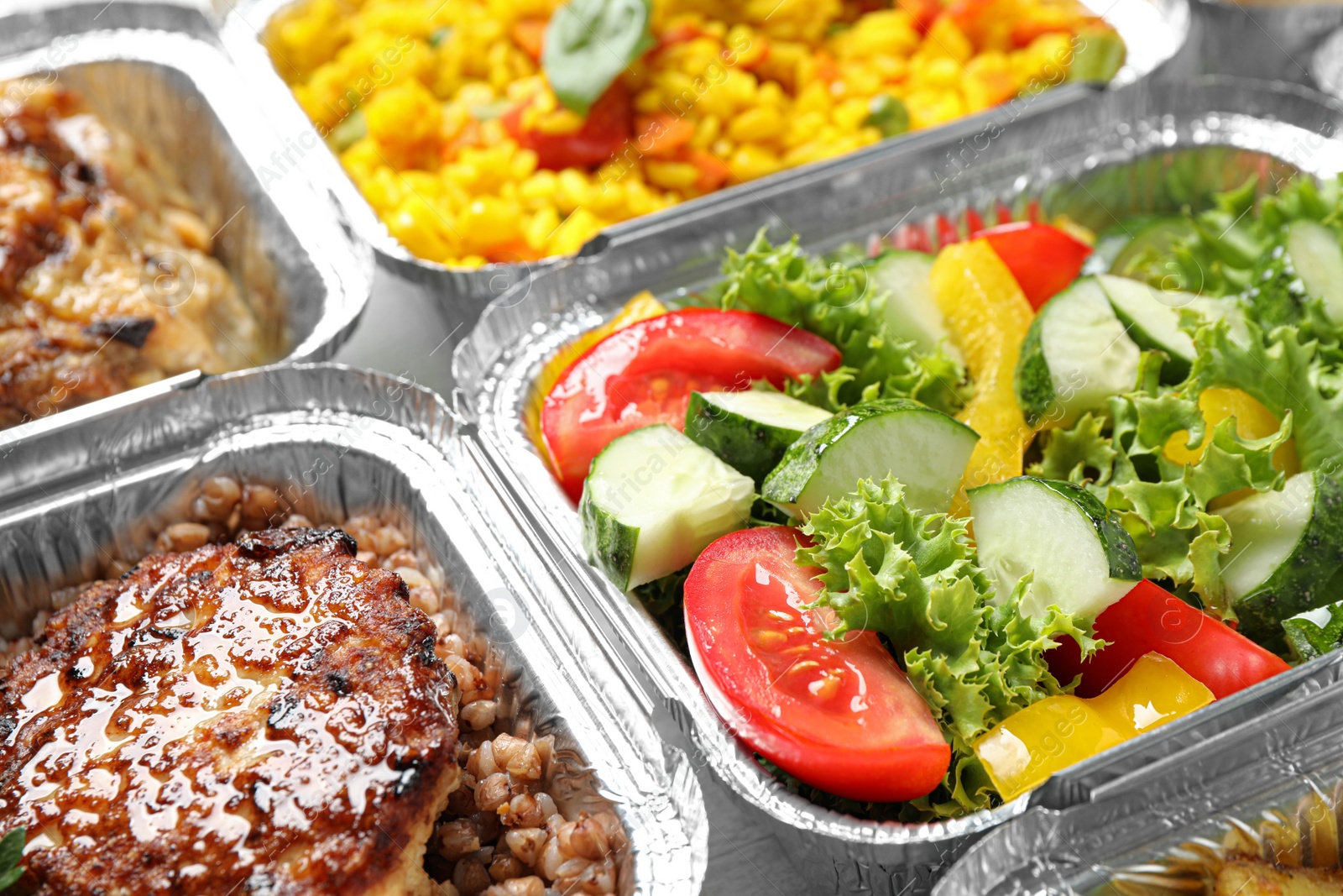 Photo of Lunchboxes on table, closeup. Healthy food delivery