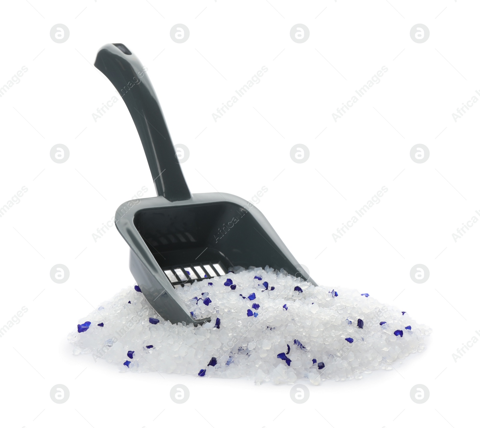 Photo of Grey plastic scoop and cat litter isolated on white