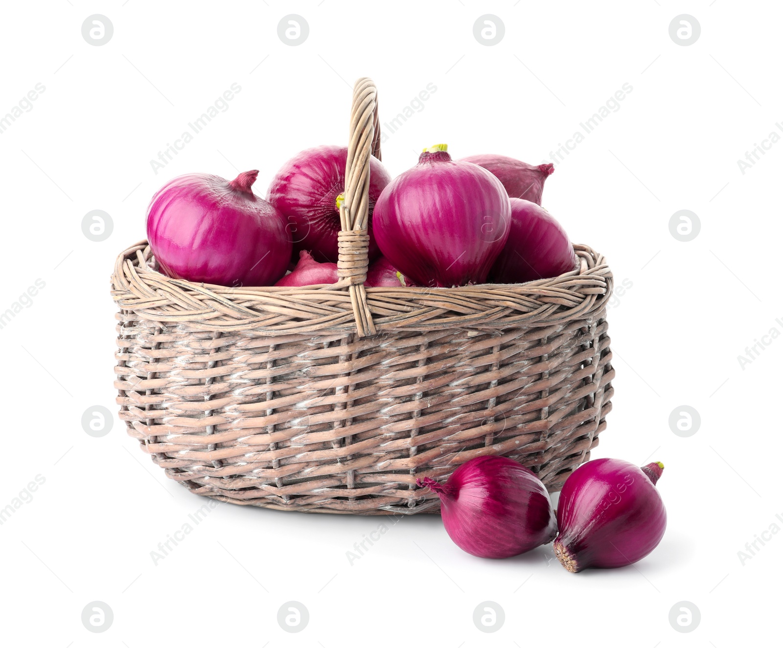 Photo of Basket full of onion bulbs isolated on white