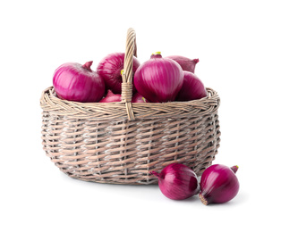 Photo of Basket full of onion bulbs isolated on white