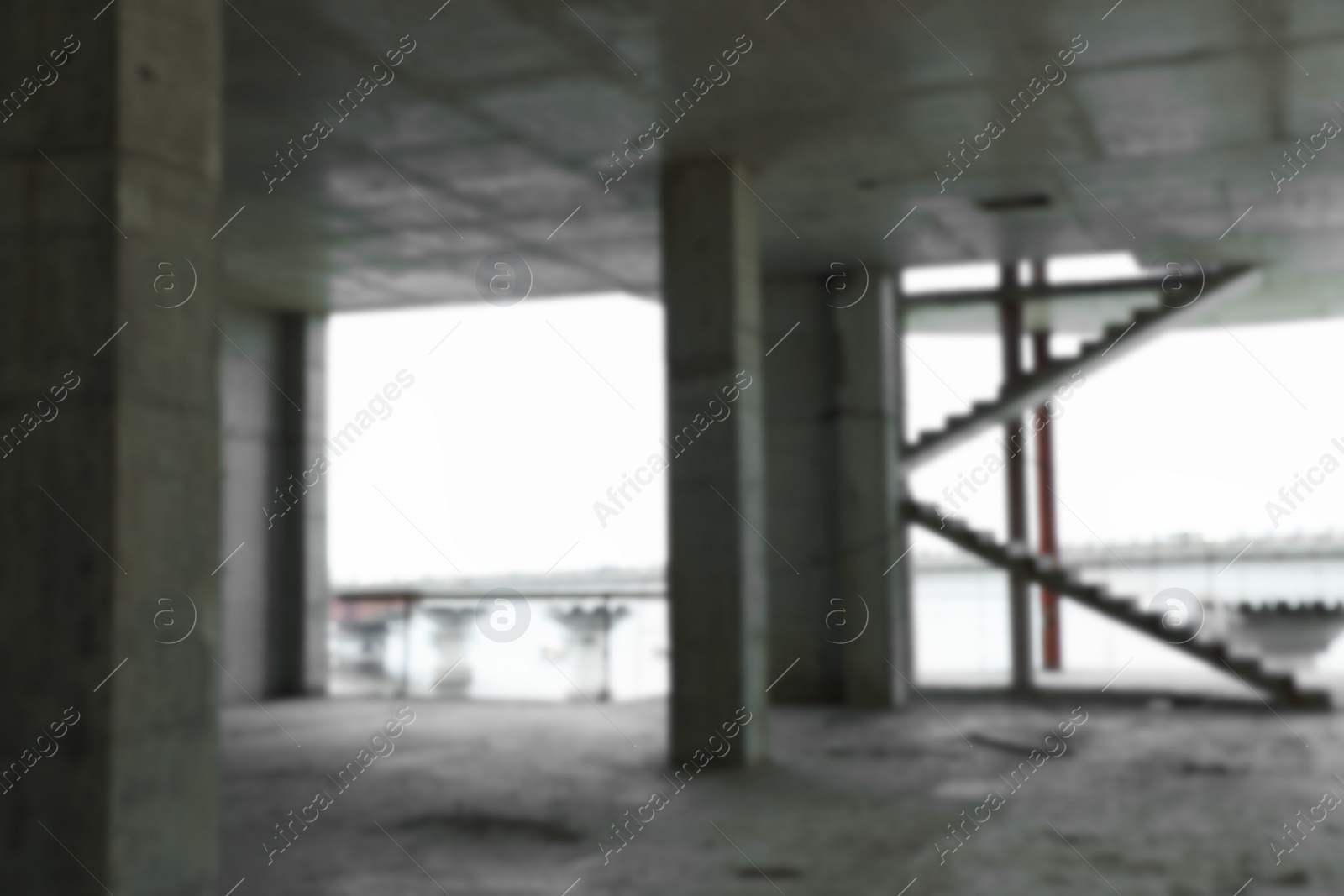 Photo of Blurred view of unfinished building indoors. Construction safety rules