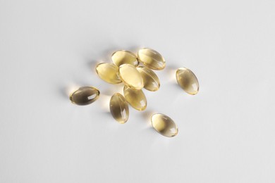 Many pills on white background, top view