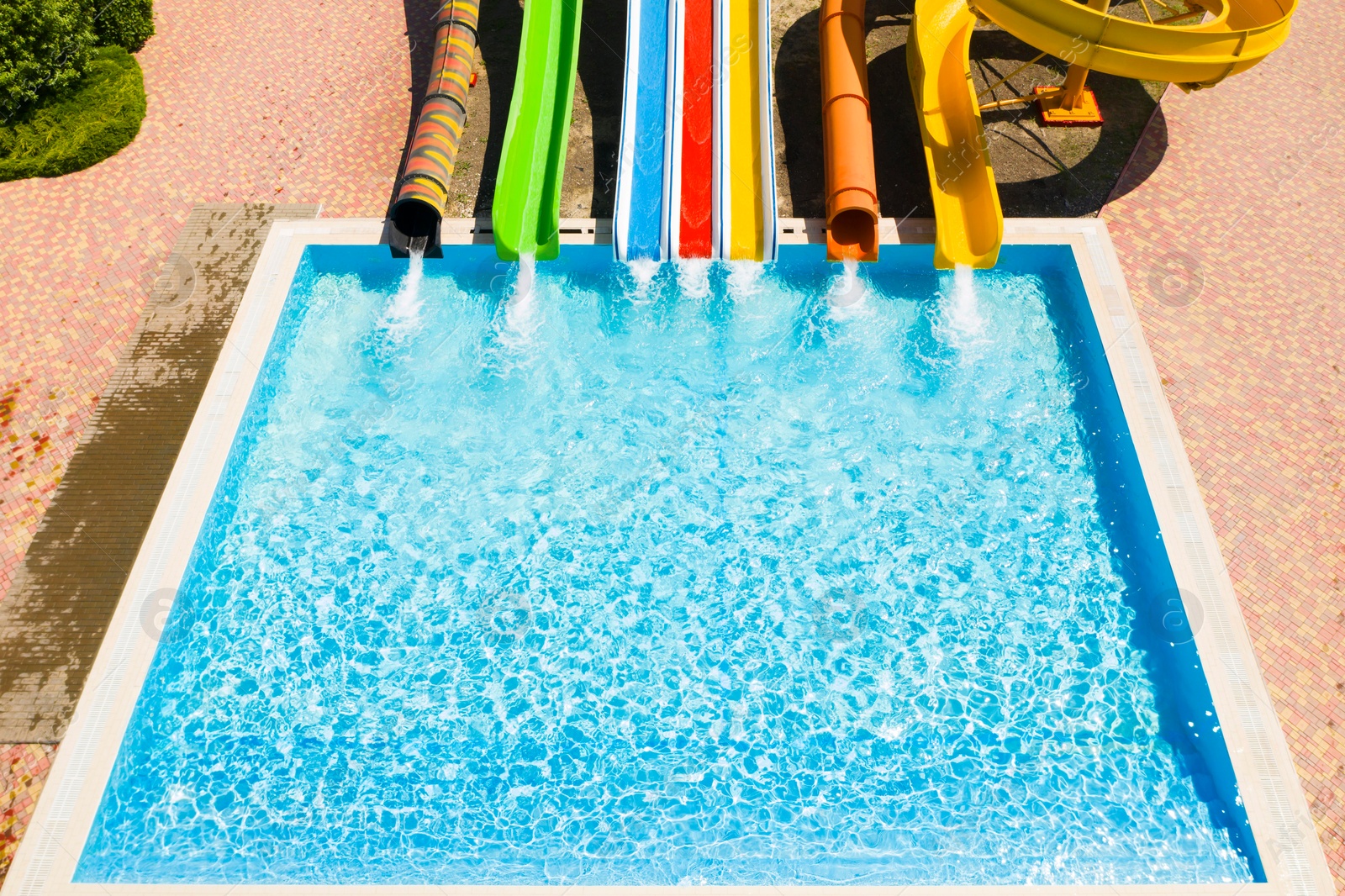 Image of Aerial view of water park on sunny day