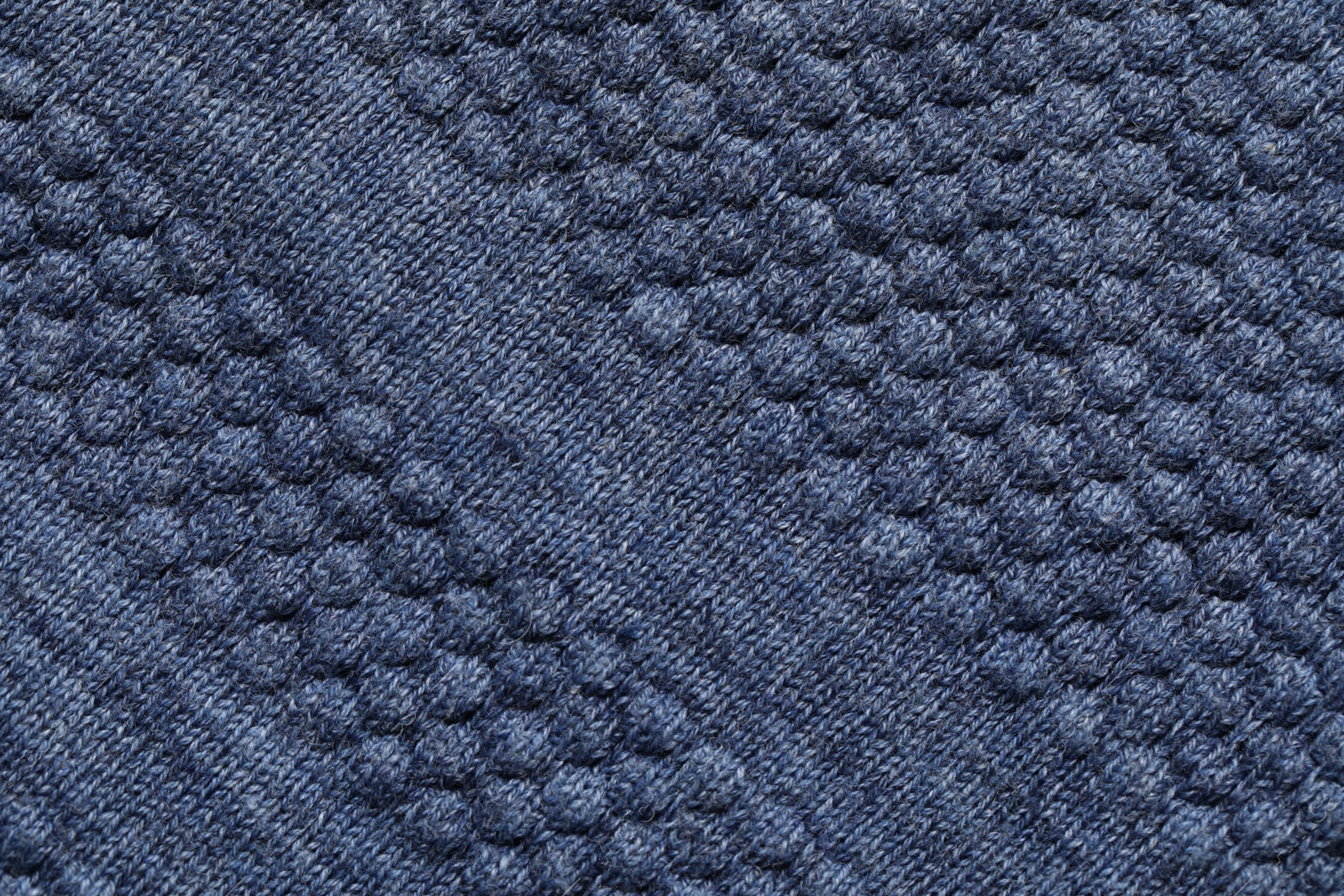 Photo of Texture of soft blue fabric as background, top view