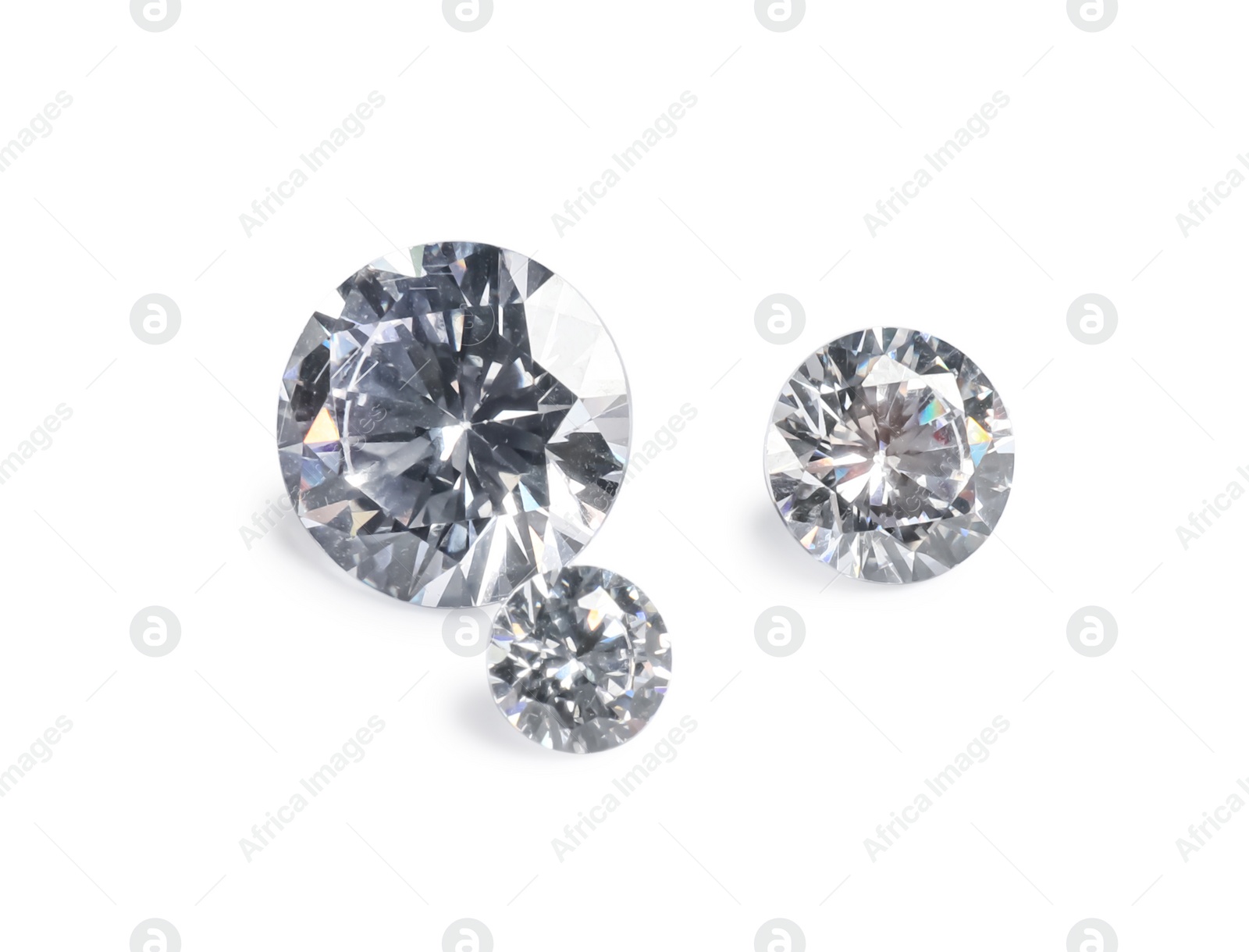 Photo of Different beautiful shiny diamonds isolated on white