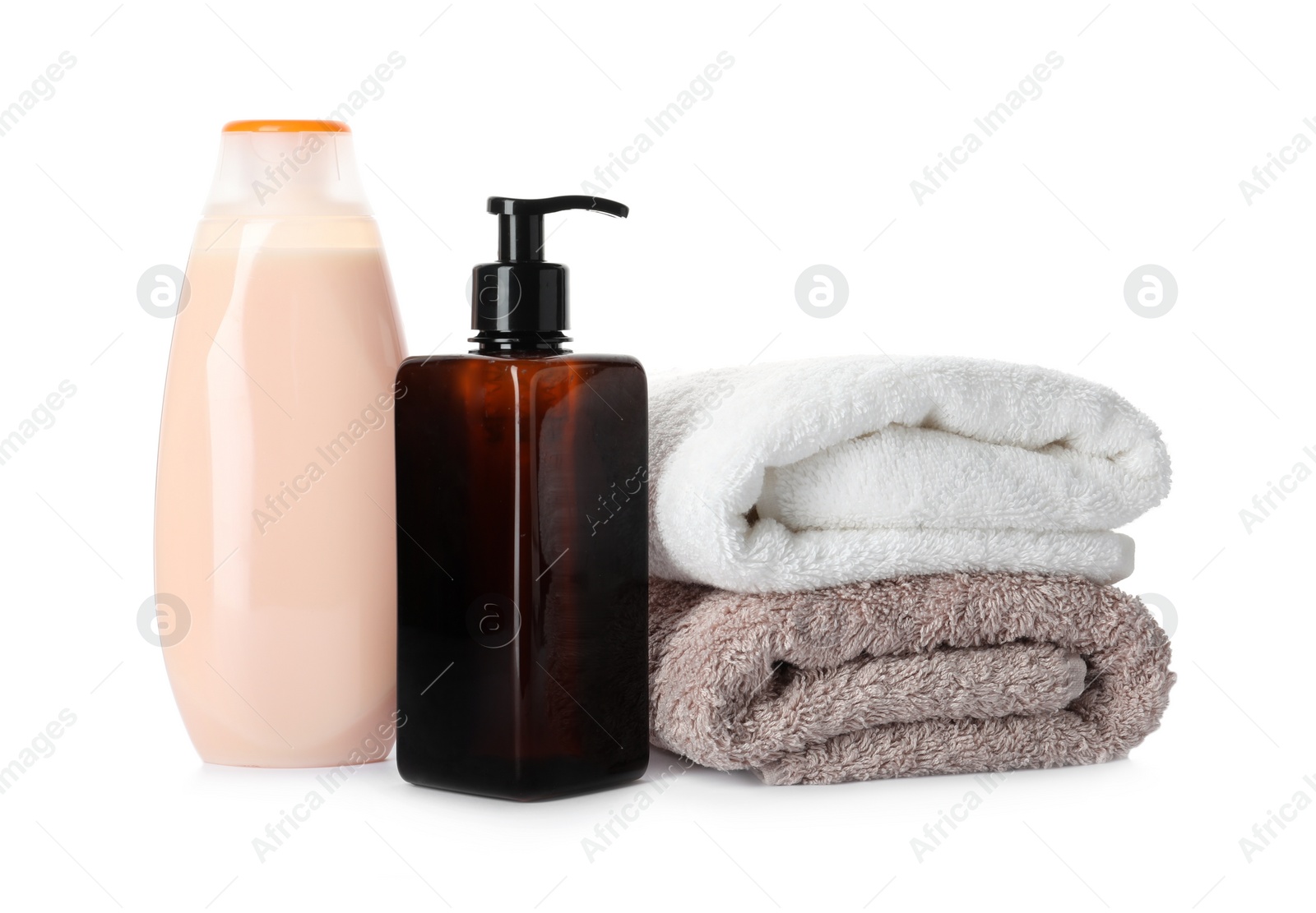 Photo of Personal hygiene products and towels on white background