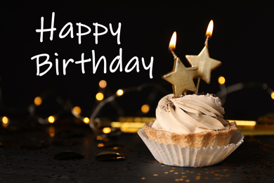 Photo of Birthday cupcake with candles and text Happy Birthday against black background