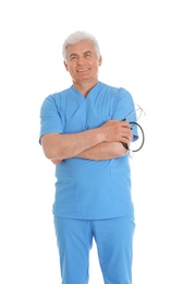 Photo of Portrait of male doctor in scrubs with stethoscope isolated on white. Medical staff