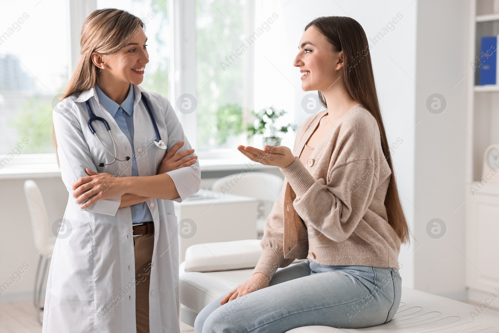 Photo of Professional doctor working with patient in hospital