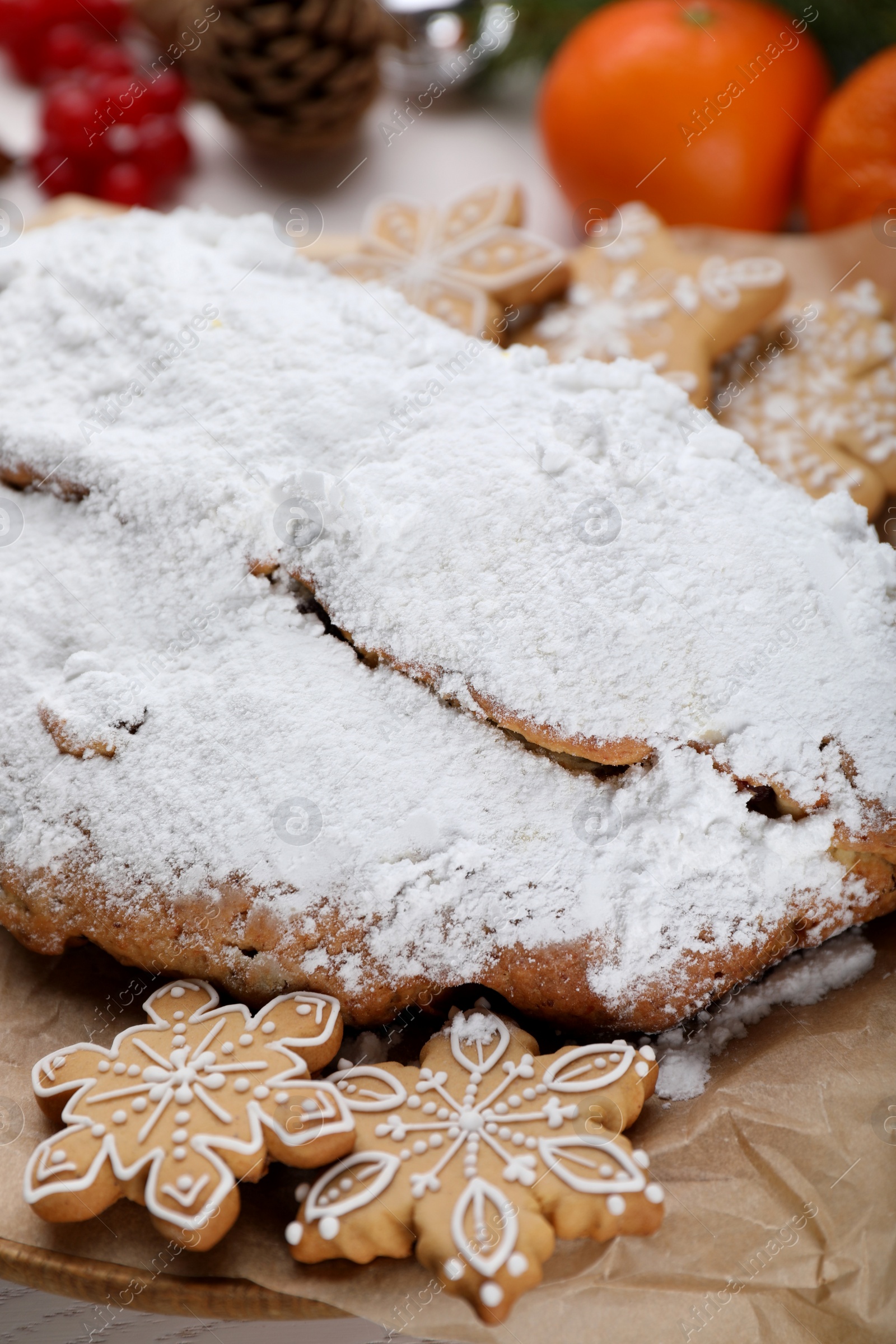 Photo of Traditional Christmas Stollen with icing sugar, closeup
