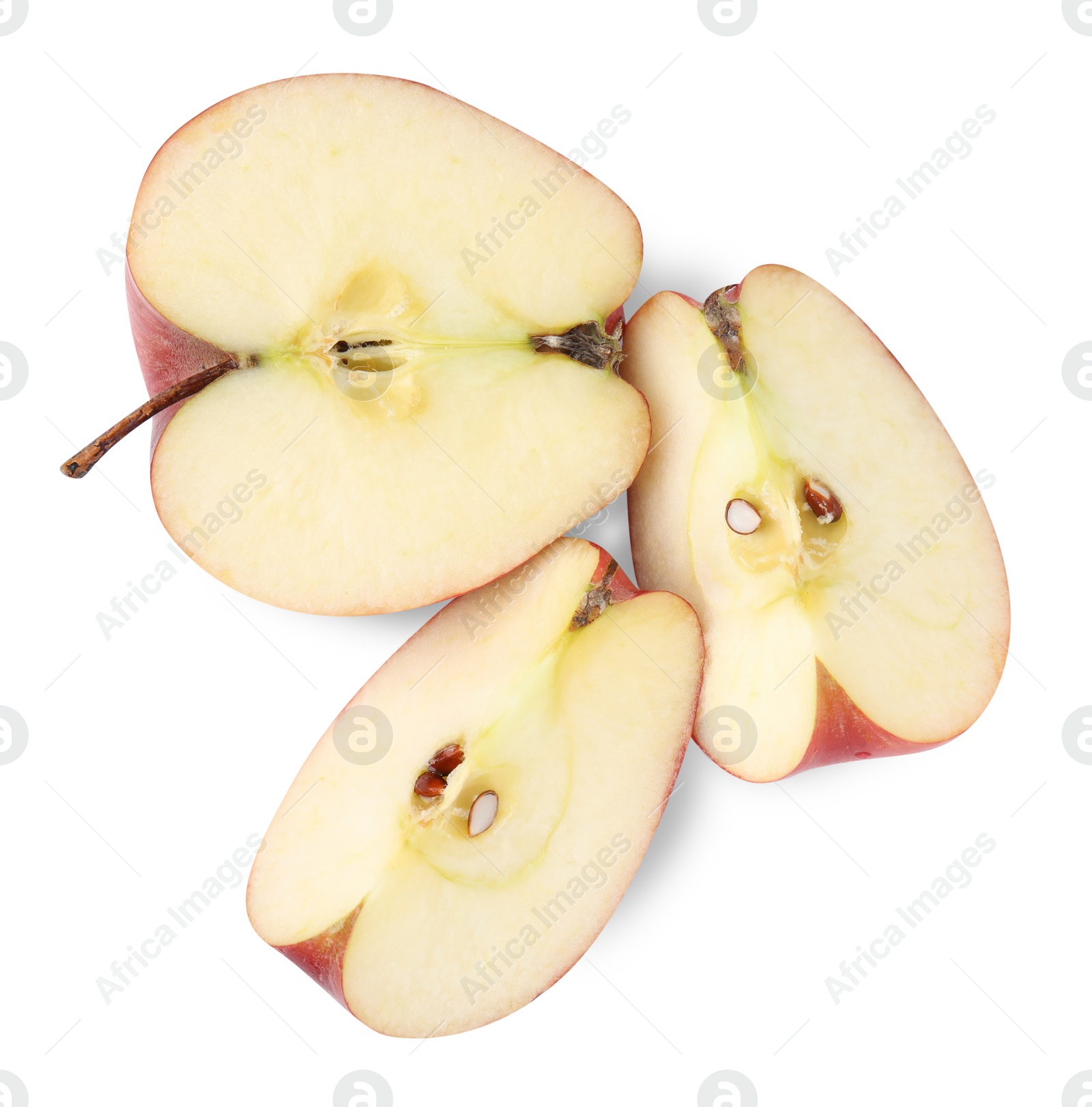 Pieces of ripe red apple isolated on white, top view Photo of Pieces of ripe red apple isolated on white, top view