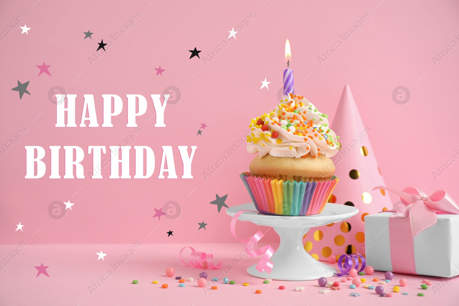 Image of Text Happy Birthday, party items and delicious cupcake with candle on pink background