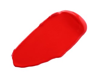 Red paint sample on white background, top view