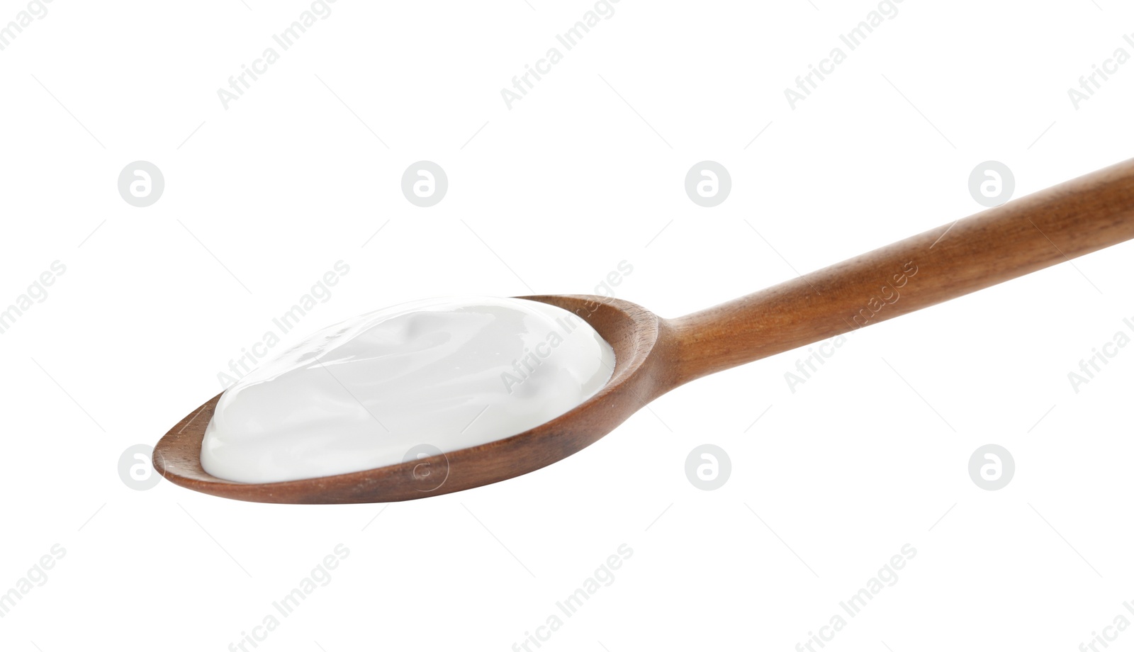 Photo of Spoon with creamy yogurt on white background