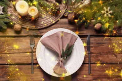 Christmas place setting for festive dinner on wooden table, flat lay. Bokeh effect