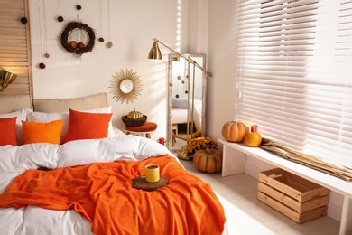 Cozy bedroom interior inspired by autumn colors