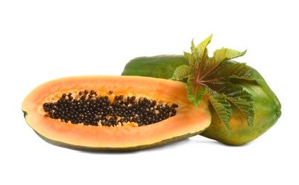 Photo of Fresh juicy ripe papayas with leaf on white background