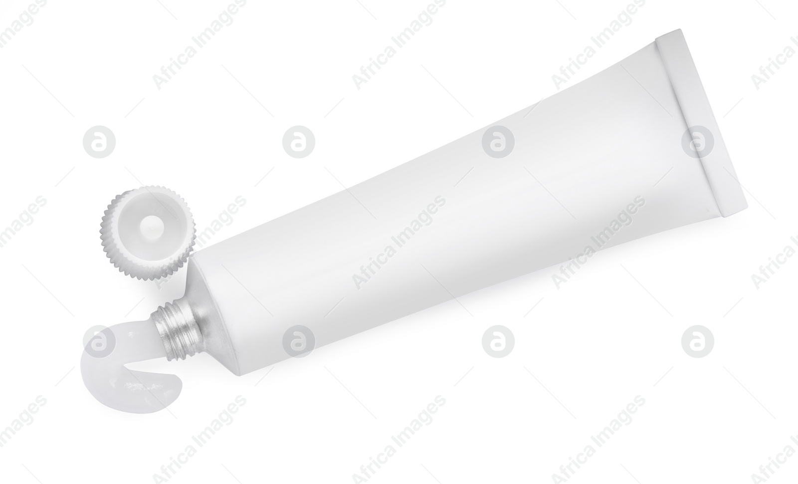 Photo of Open tube of ointment isolated on white, top view. Space for text