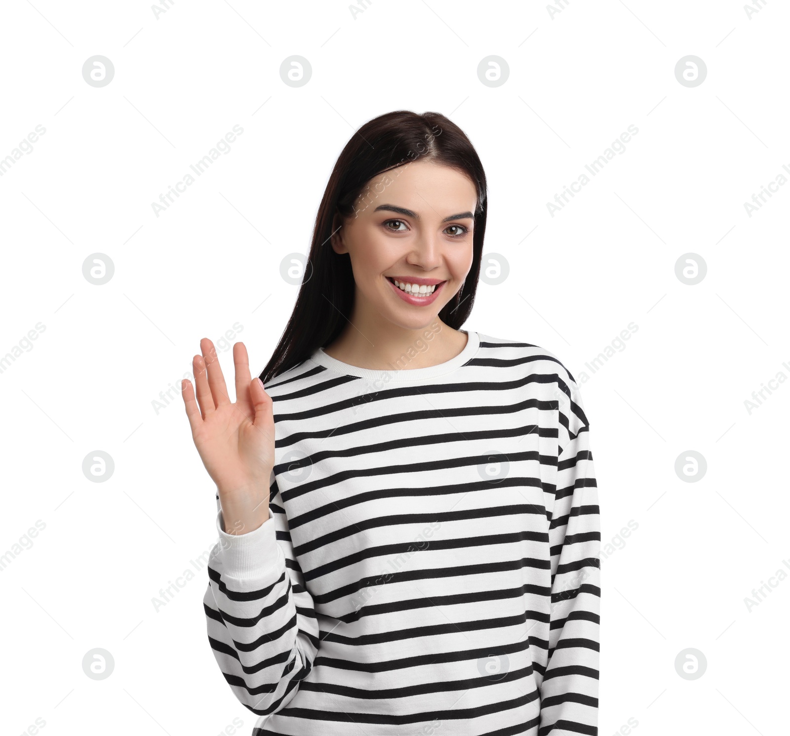 Photo of Attractive young woman showing hello gesture on white background
