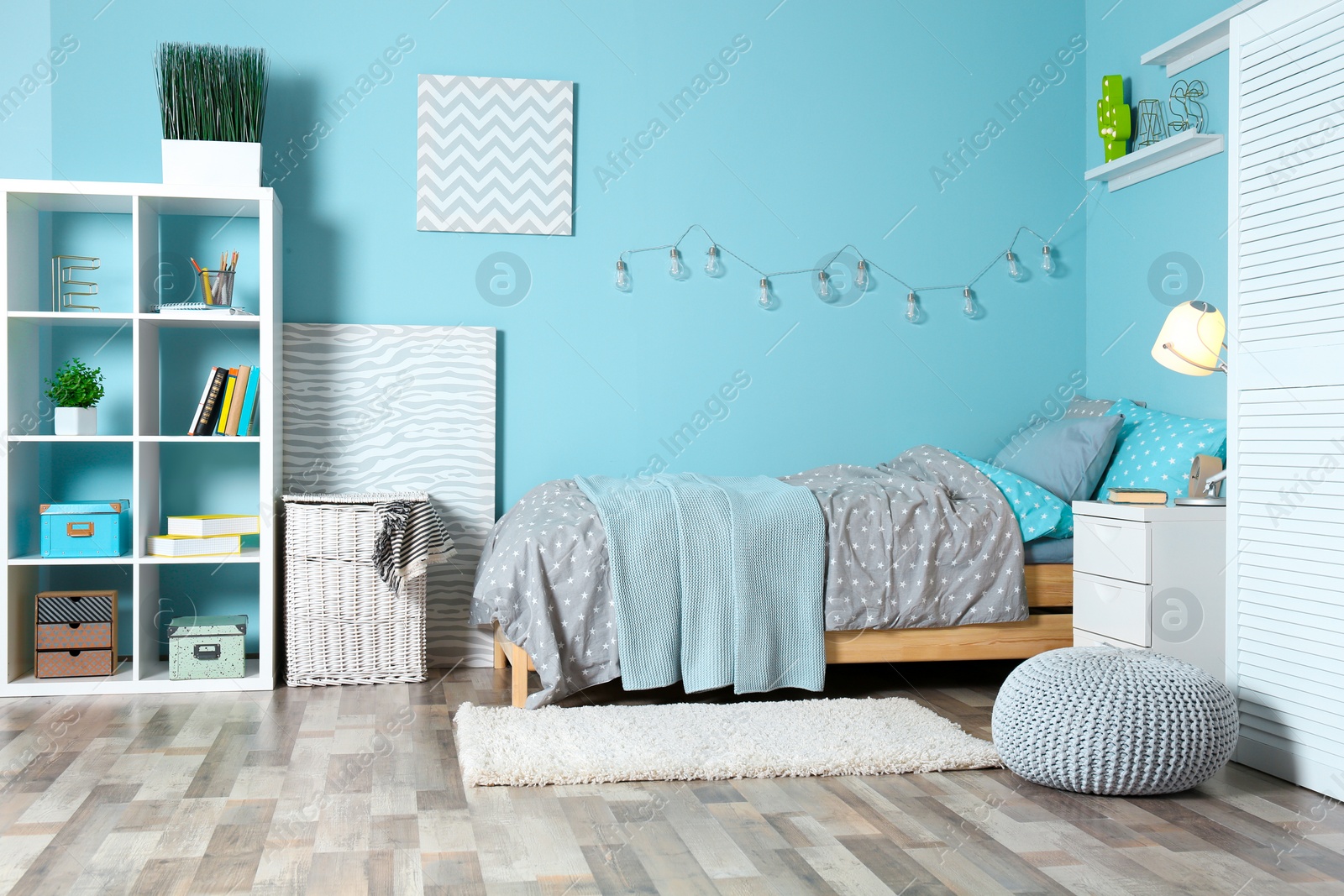 Photo of Comfortable bed in modern children room