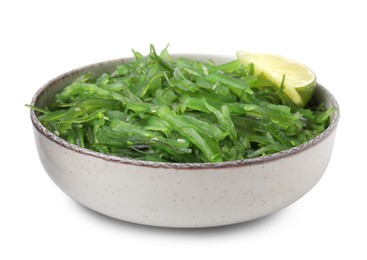 Tasty seaweed salad in bowl isolated on white