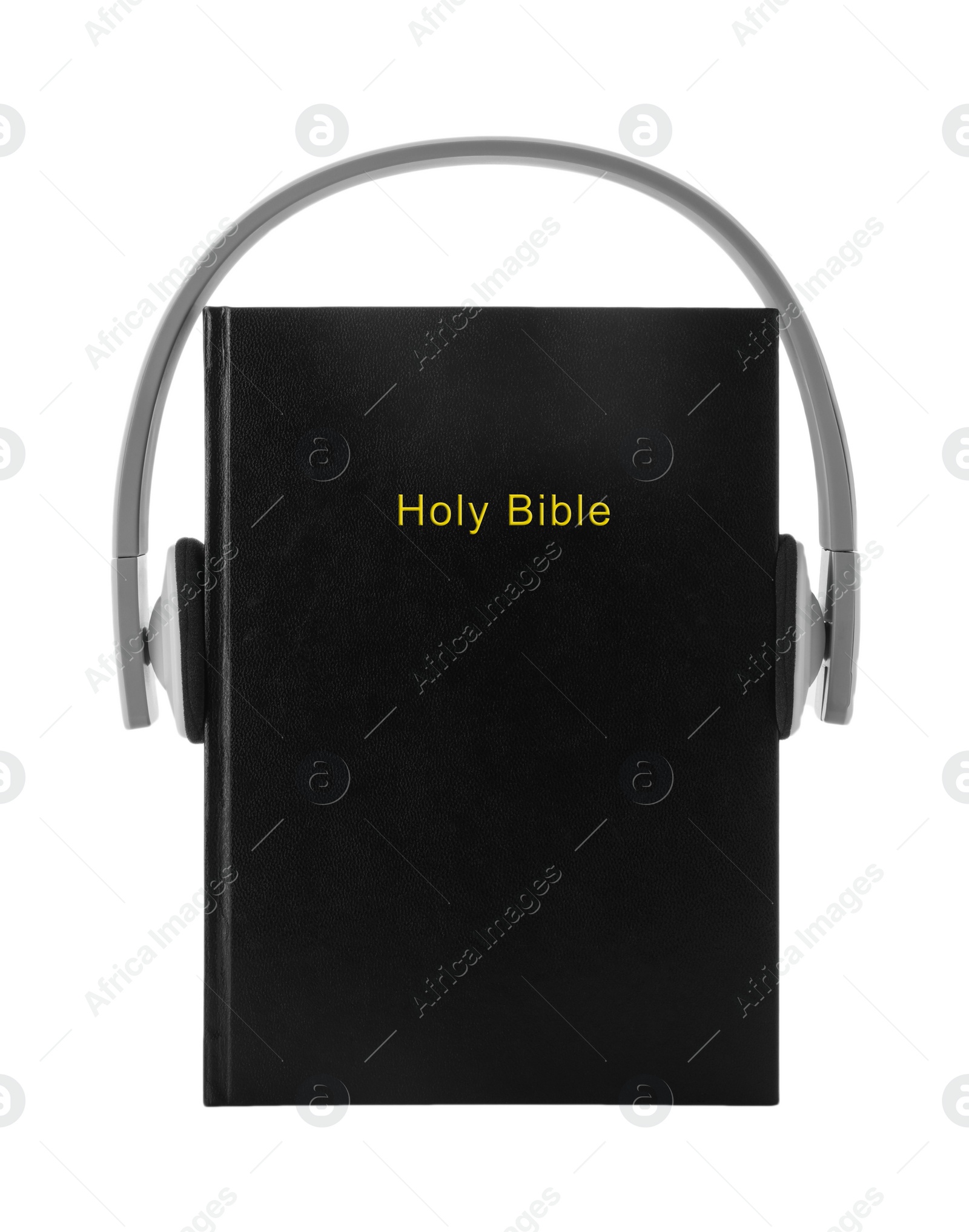 Photo of Bible and headphones on white background. Religious audiobook