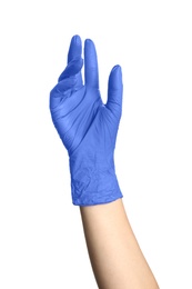 Woman in blue latex gloves holding something on white background, closeup of hand