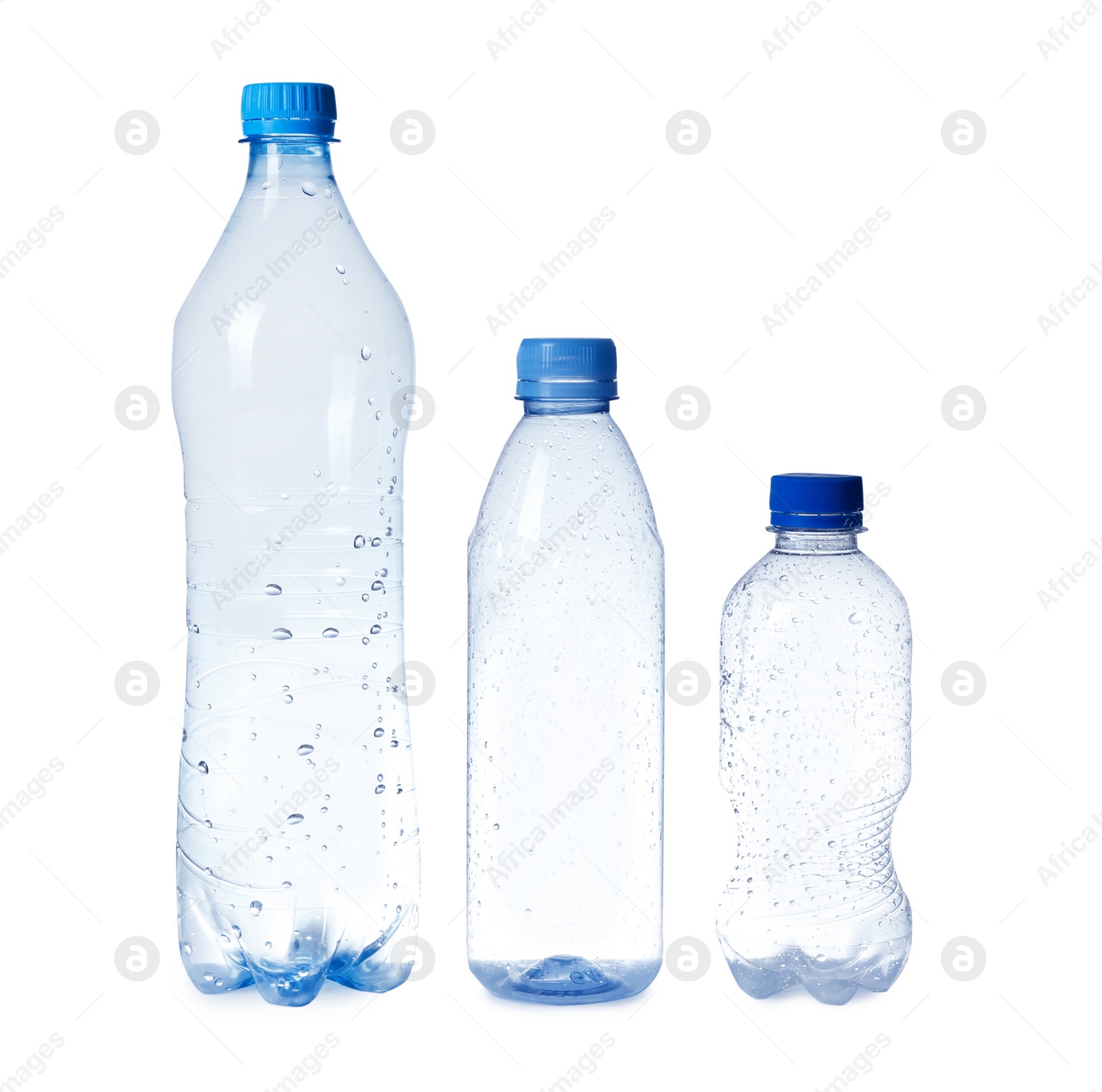 Photo of Empty plastic bottles on white background. Recycling problem