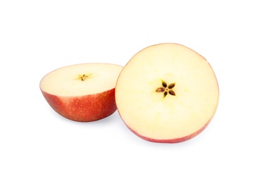 Halves of ripe red apple on white background