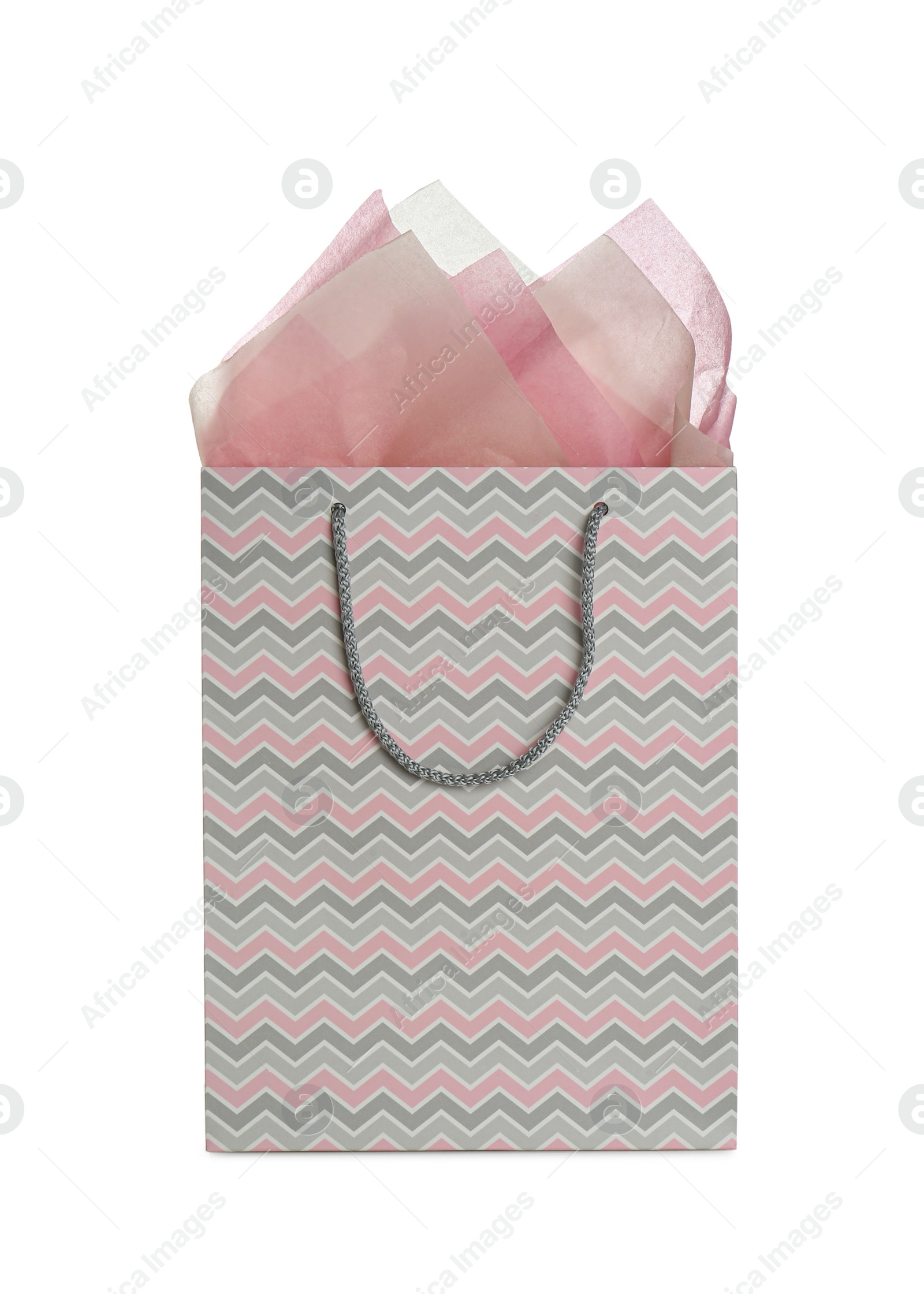 Photo of Gift bag with paper on white background