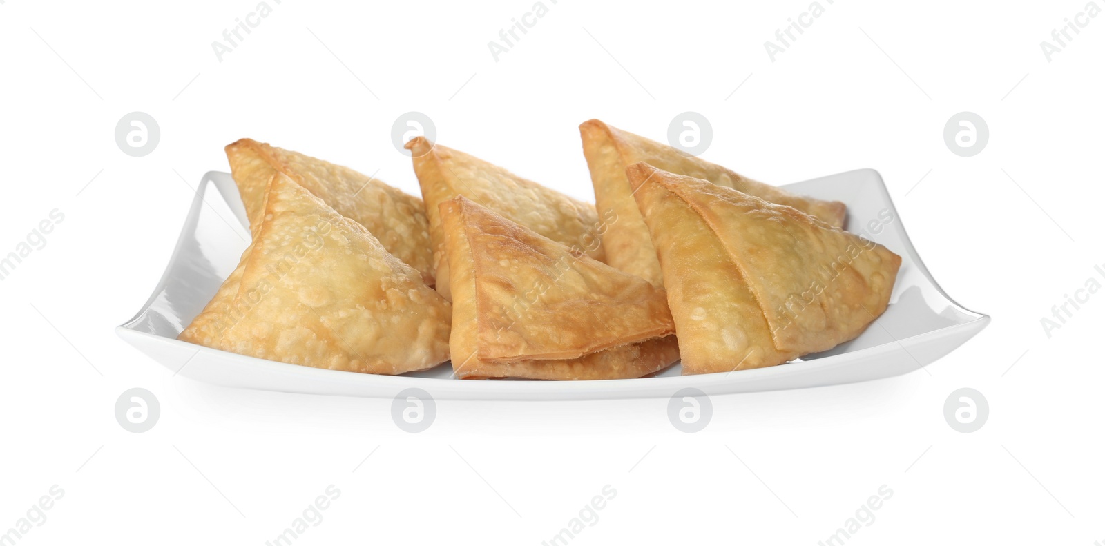 Photo of Fresh delicious crispy samosas on white background