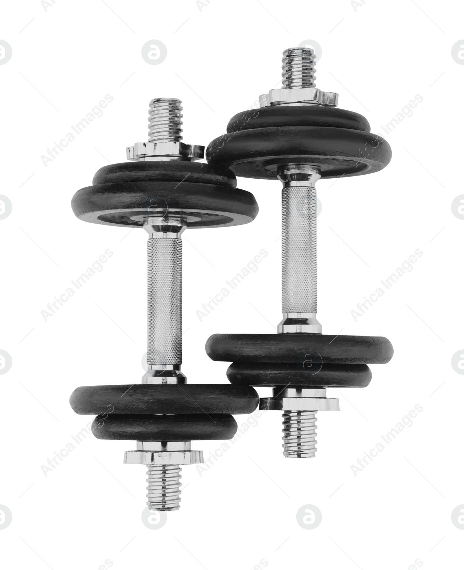 Photo of Metal dumbbells isolated on white, top view. Sports equipment