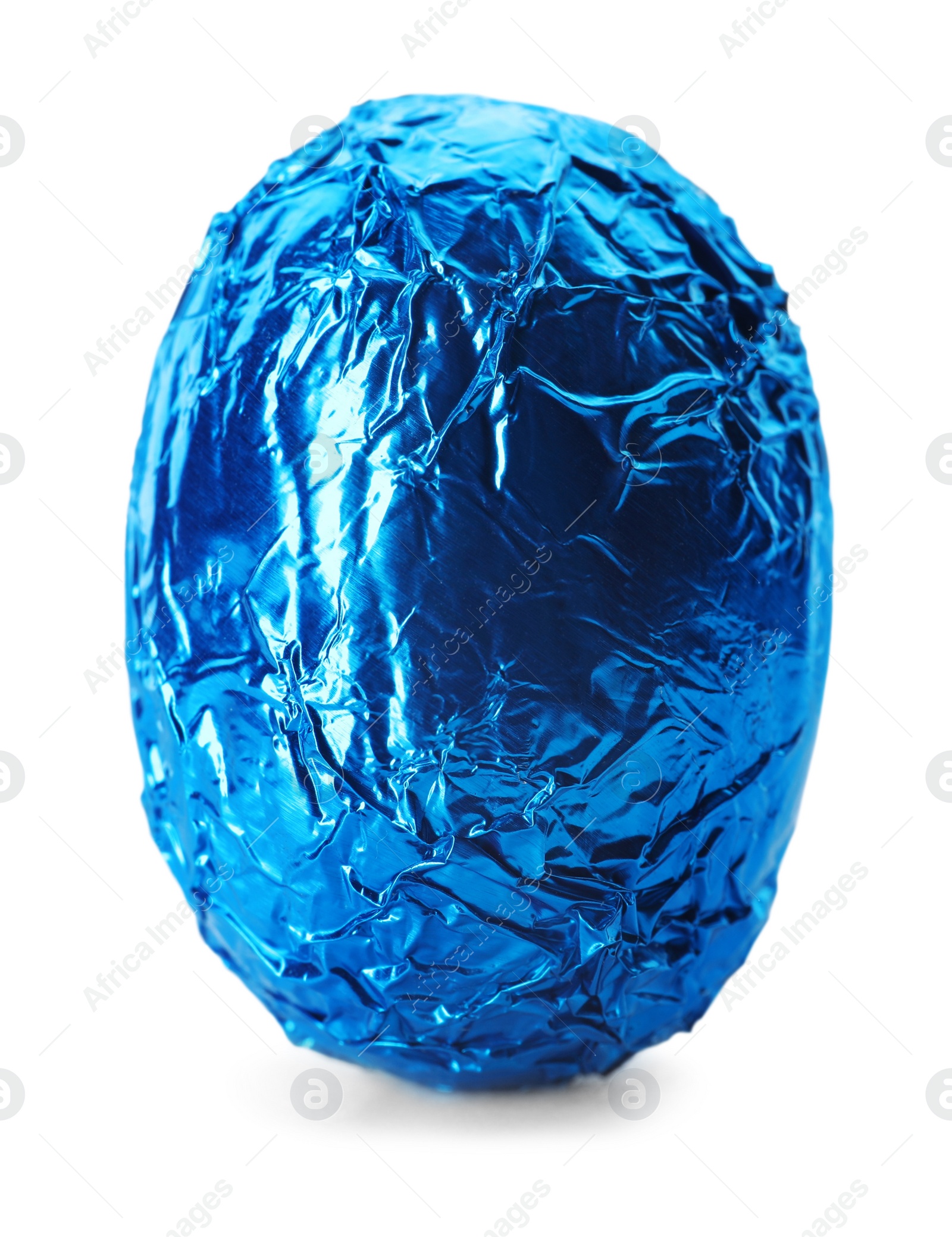 Photo of Chocolate egg wrapped in bright blue foil isolated on white